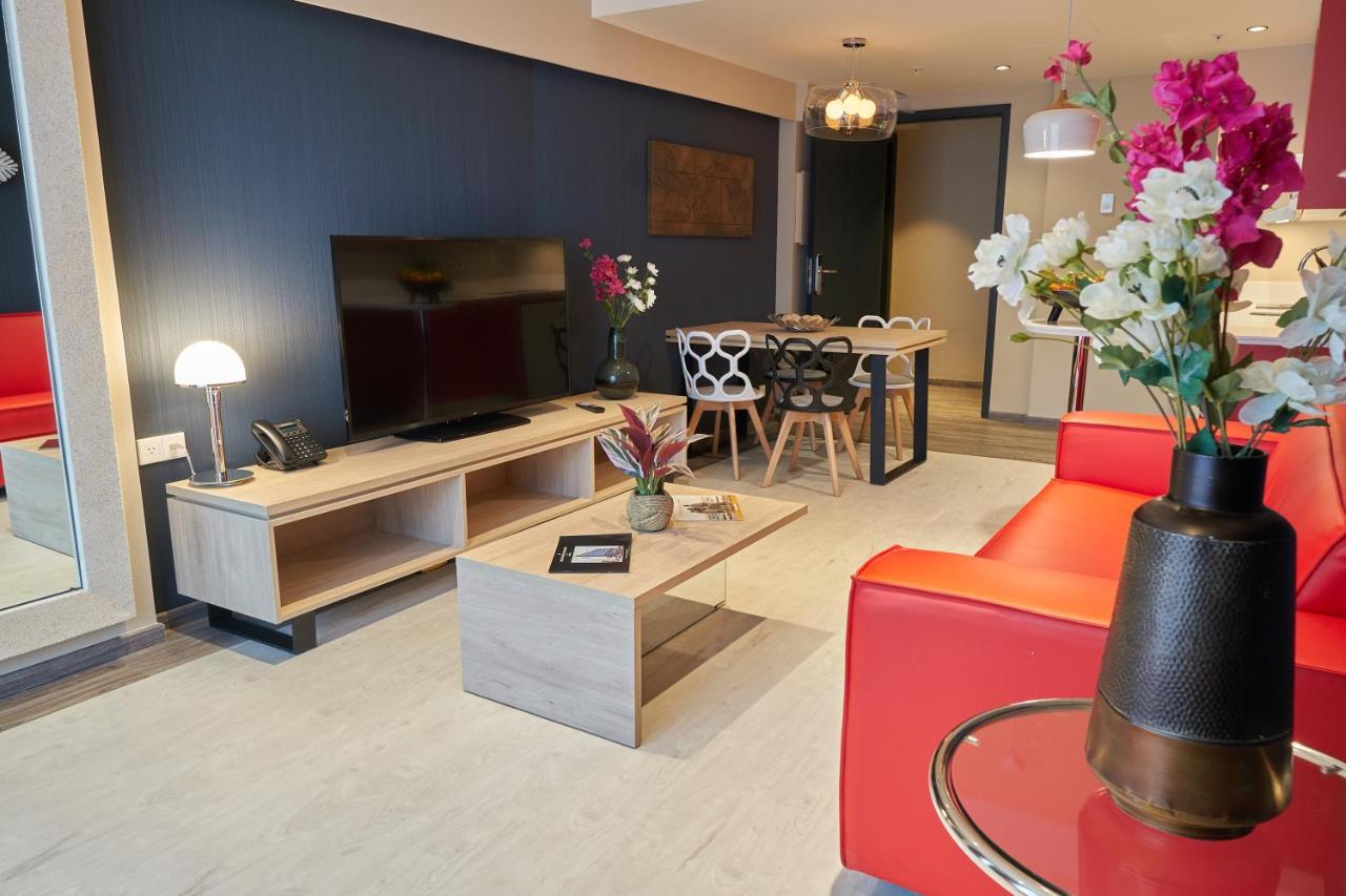 Gran Evenia Panama Hotel Exterior photo A living room in a serviced apartment in Paris, France