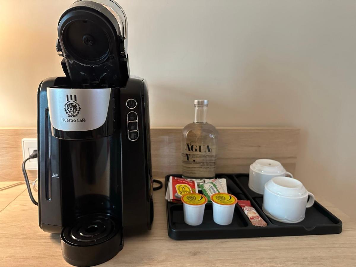 Gran Evenia Panama Hotel Exterior photo A single serve coffee machine